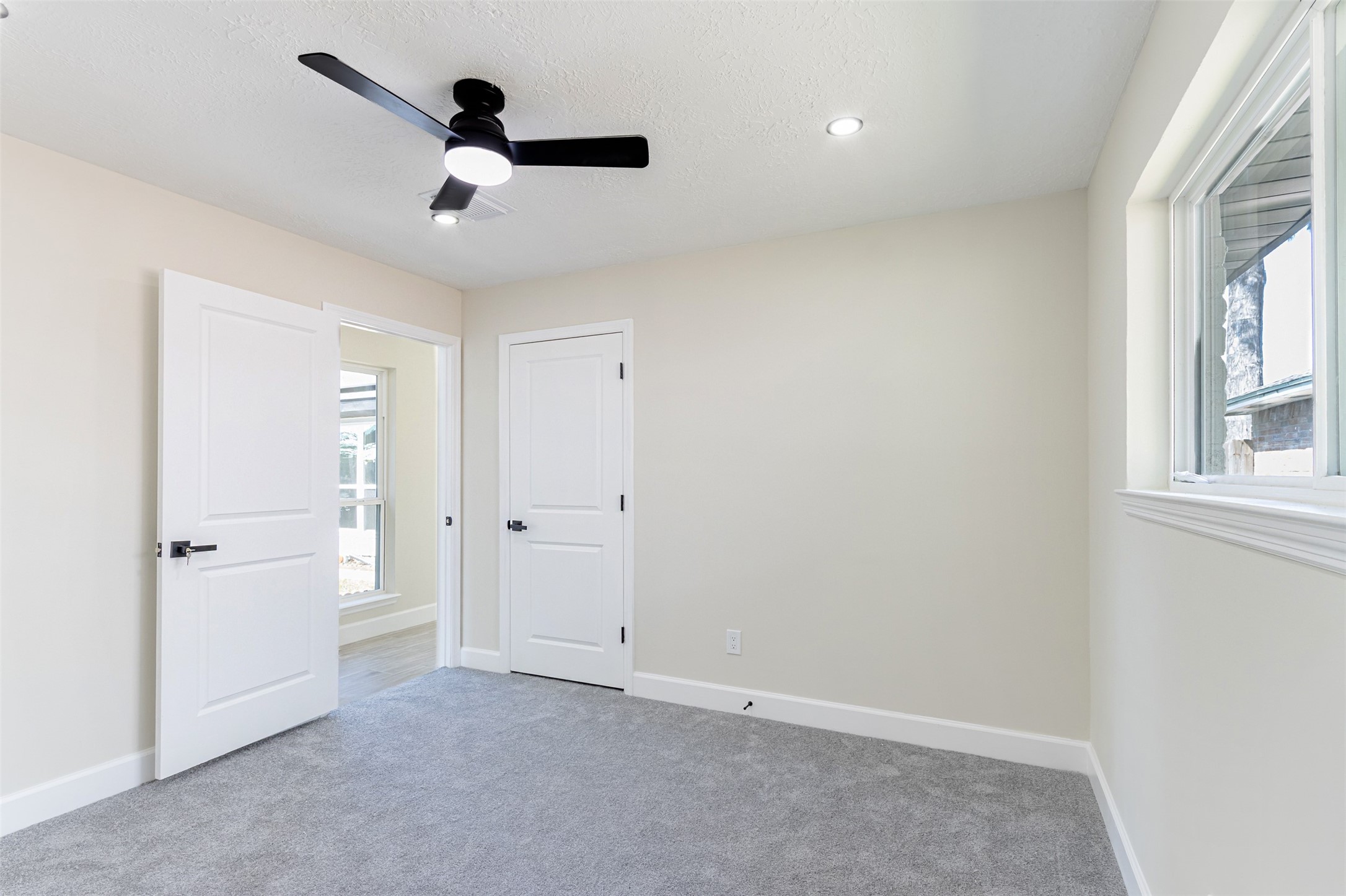 11203 Rousseau Drive Houston, TX 77065 - Photo 31 of 50 wooden floor in an empty room with a window
