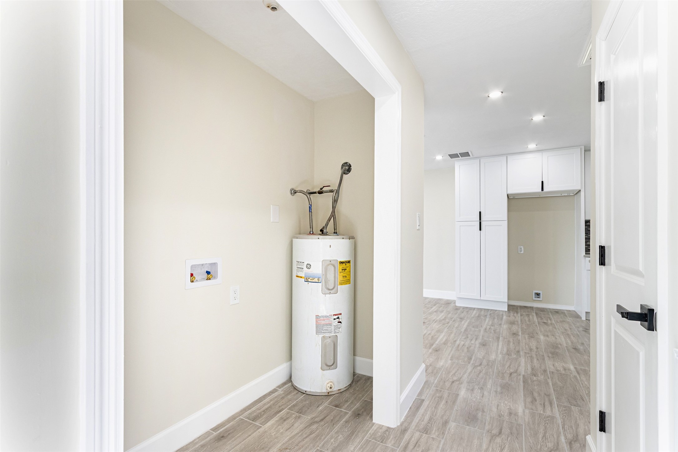 11203 Rousseau Drive Houston, TX 77065 - Photo 38 of 50 a view of hallway with wooden floor