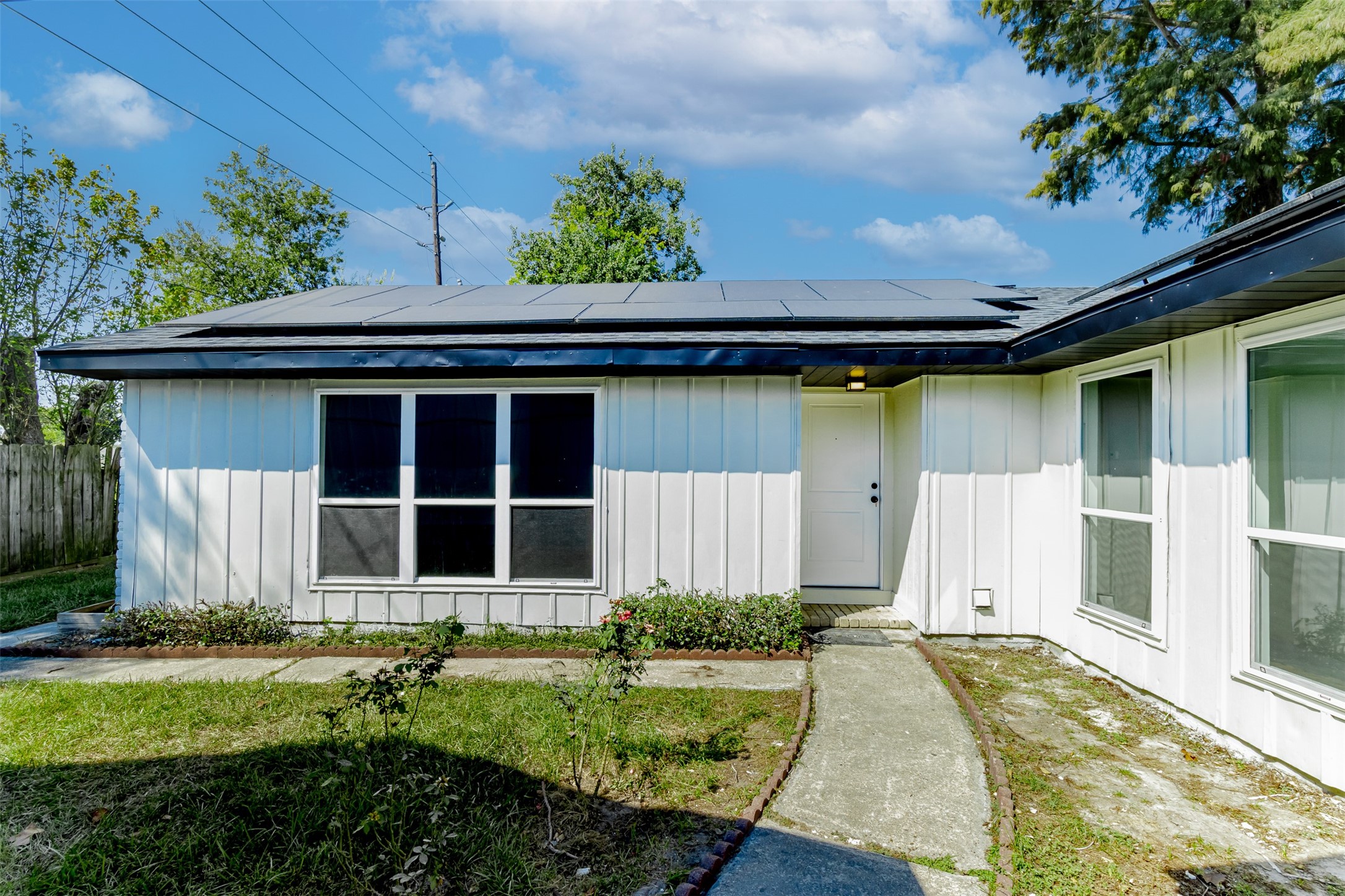 11203 Rousseau Drive Houston, TX 77065 - Photo 40 of 50 a house with garden in front of it