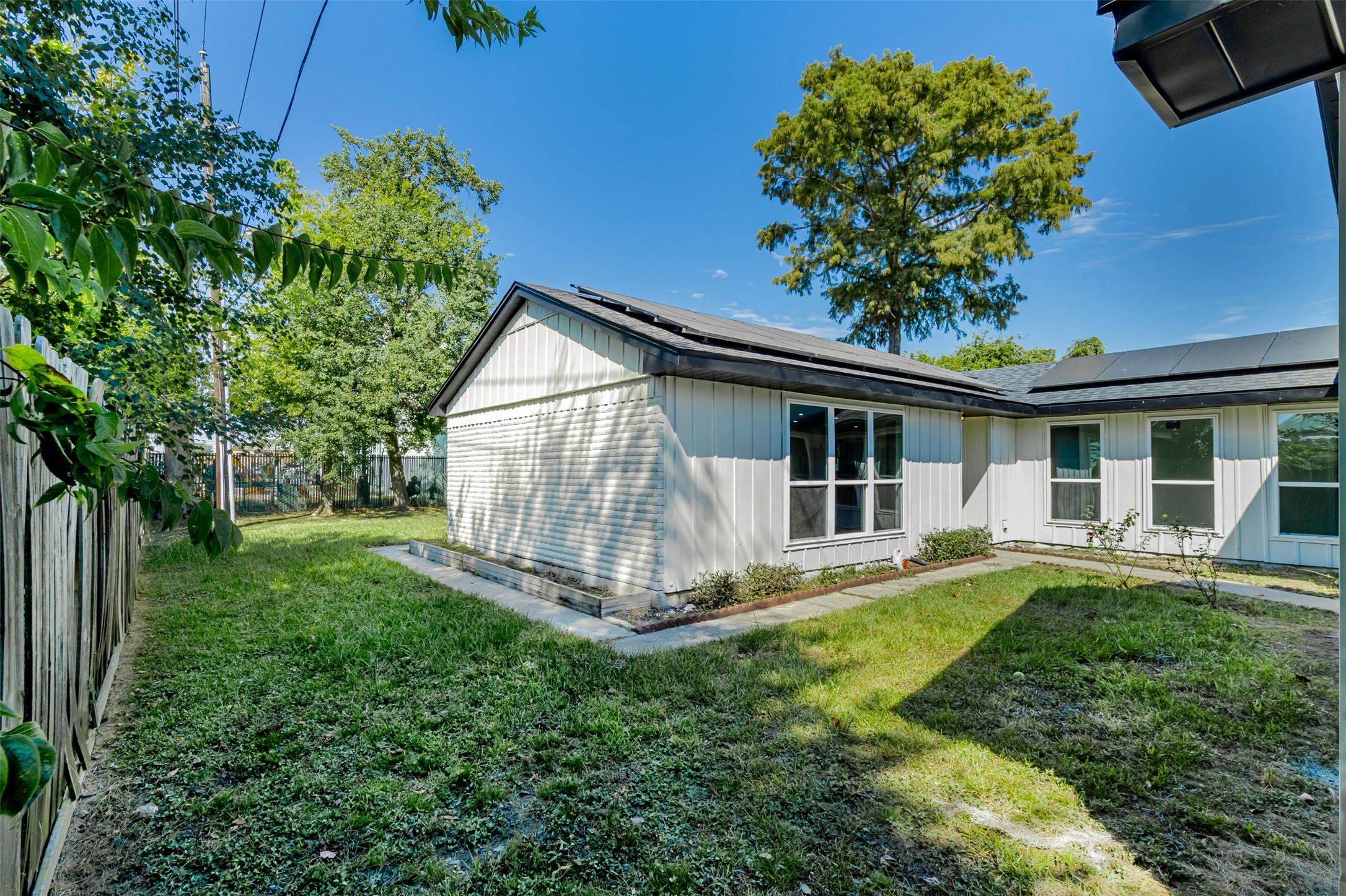 11203 Rousseau Drive Houston, TX 77065 - Photo 47 of 50 a view of a house with a yard and sitting area