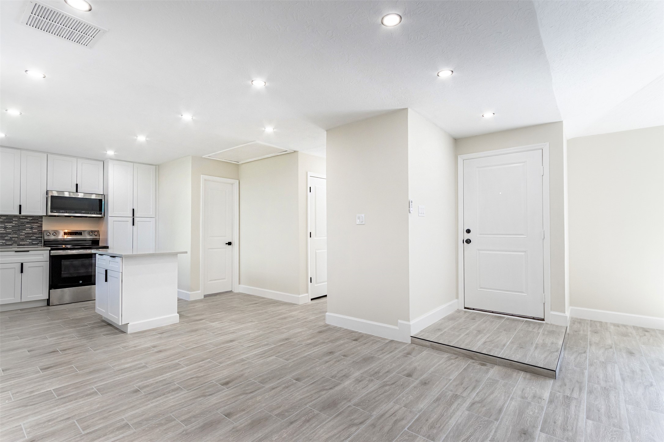 11203 Rousseau Drive Houston, TX 77065 - Photo 8 of 50 a view of kitchen with wooden floor