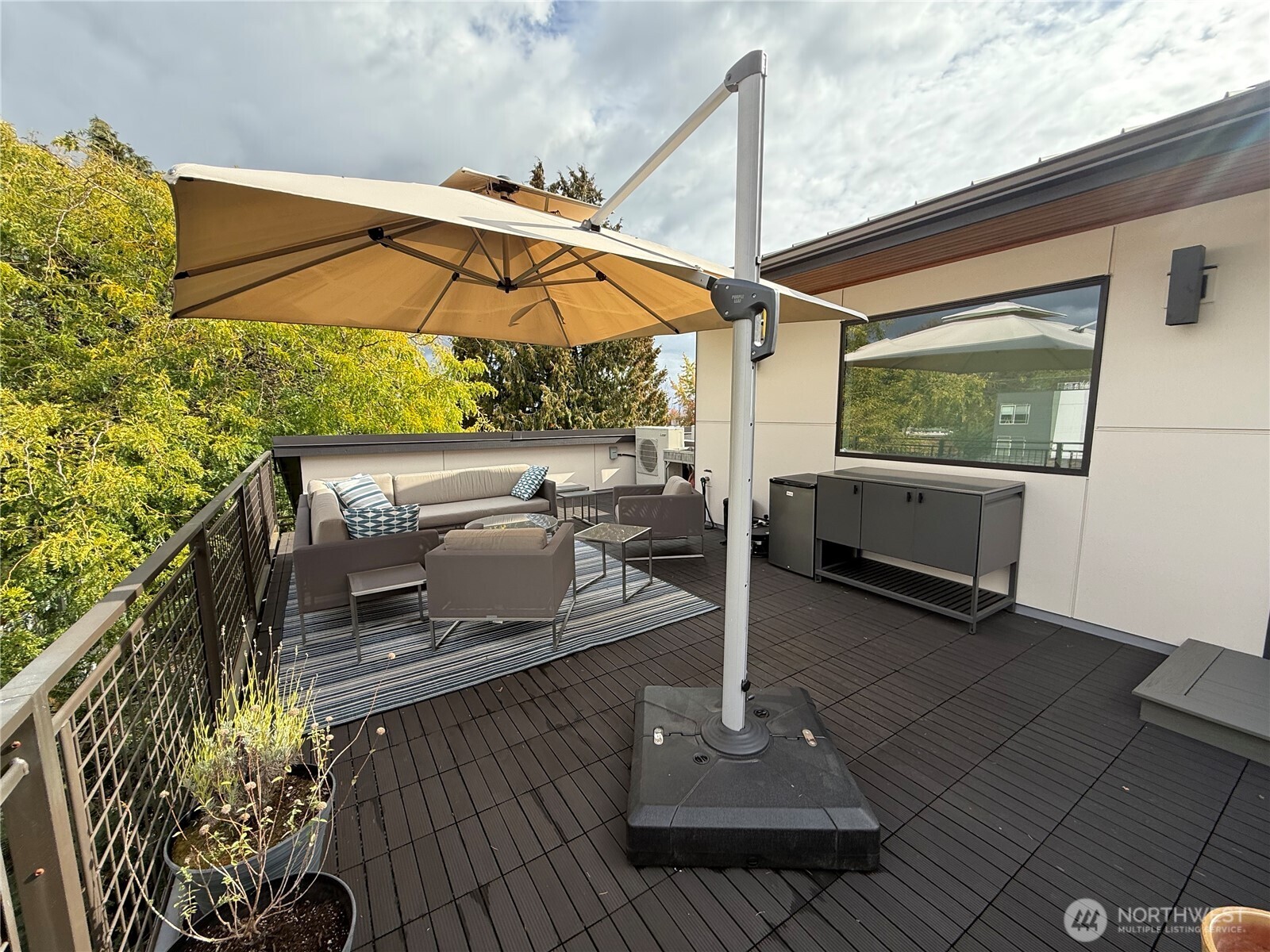 4815 Evanston Avenue North, Unit B Seattle, WA 98103 - Photo 21 of 37 a view of outdoor space with seating area