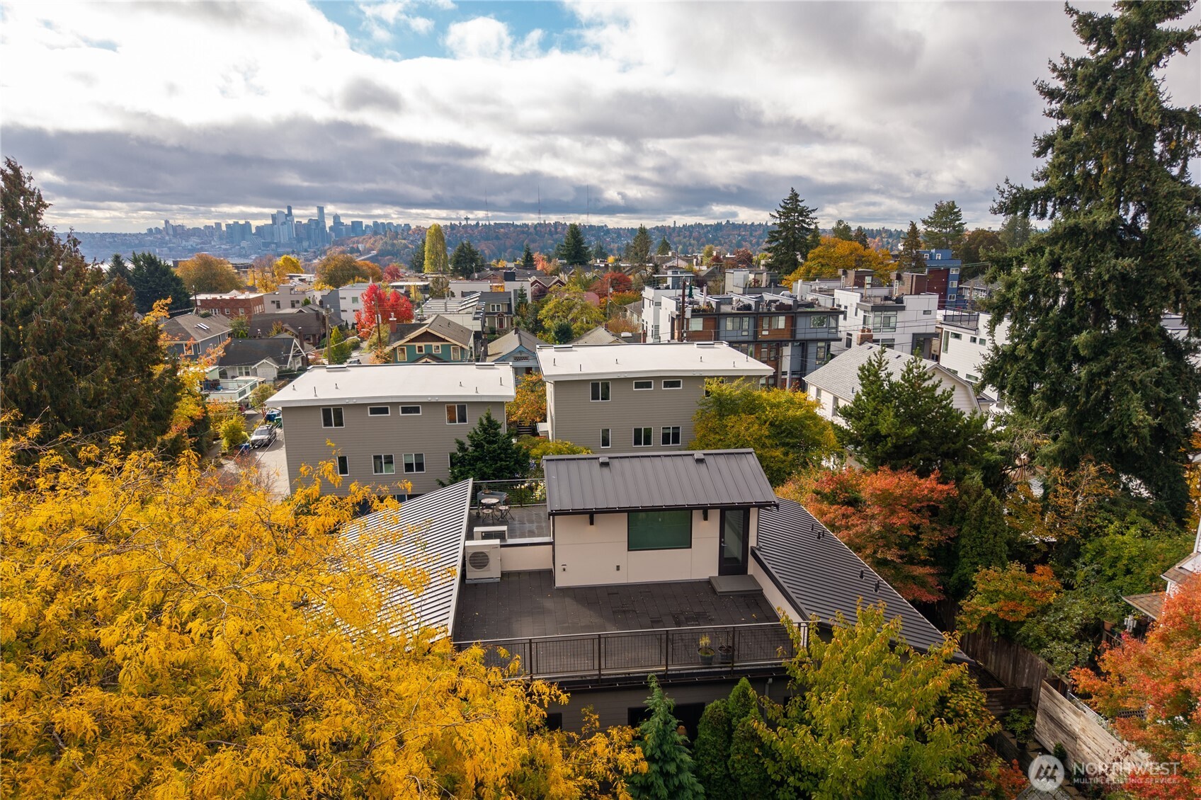 4815 Evanston Avenue North, Unit B Seattle, WA 98103 - Photo 24 of 37 a view of a city with plants