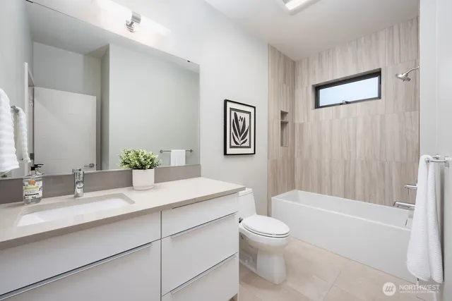 a view of a patio with chairs and plants