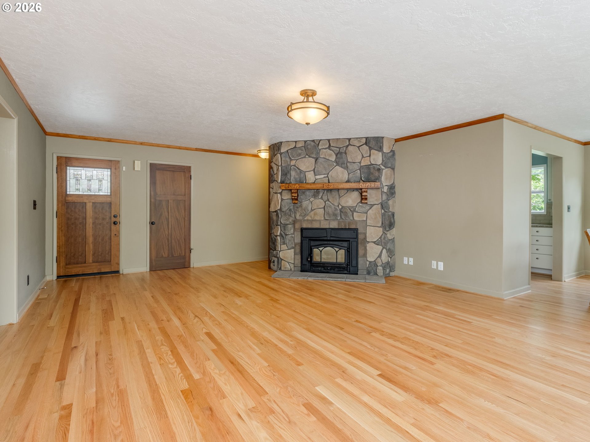 48140 Southeast Linhart Butte Road Sandy, OR 97055 - Photo 12 of 47 a view of empty room with a fireplace