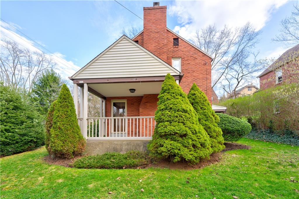271 Newburn Drive Mt. Lebanon, PA 15216 - Photo 18 of 24 a front view of a house with garden