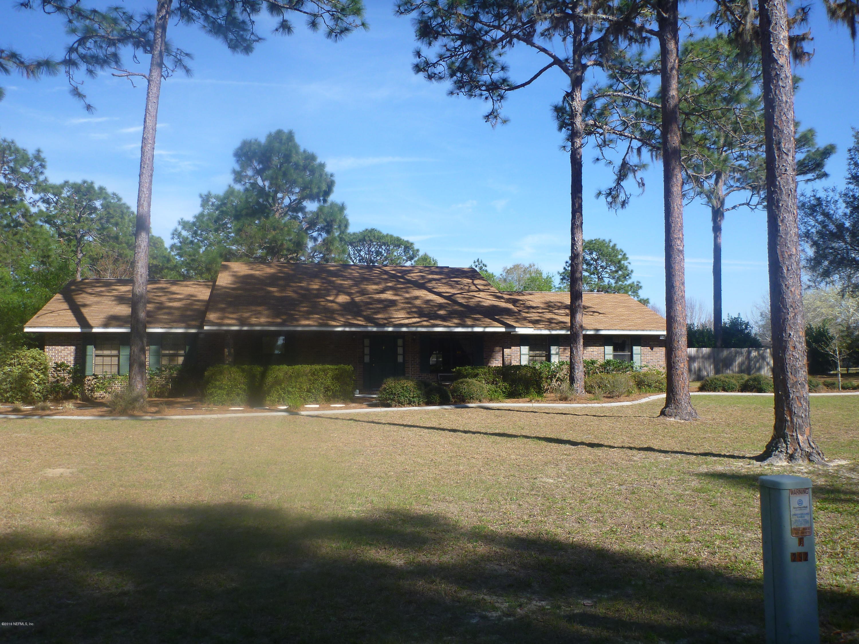 6285 Payne Road Keystone Heights, FL 32656 - Photo 1 of 31 a view of a house with a yard from a lake view