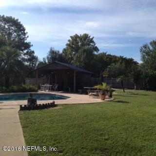 6285 Payne Road Keystone Heights, FL 32656 - Photo 7 of 31 a view of a house with swimming pool and sitting area