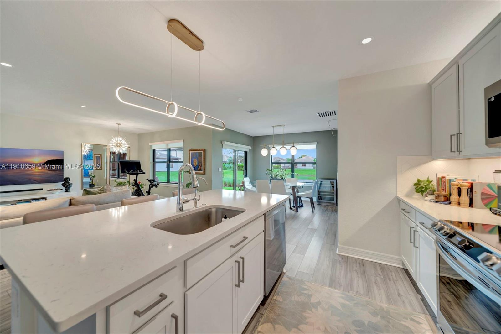 2941 Shortleaf Avenue Lauderdale Lakes, FL 33311 - Photo 20 of 47 a kitchen with sink and stove