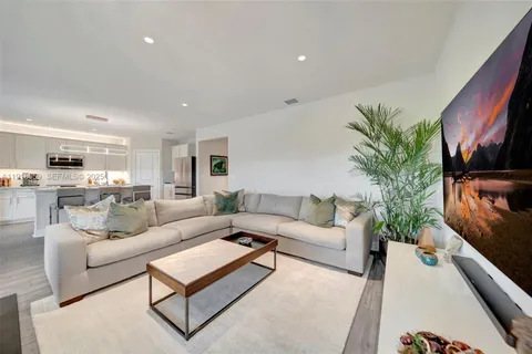 a living room with furniture and a couch