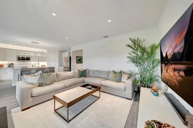 a living room with furniture and a couch