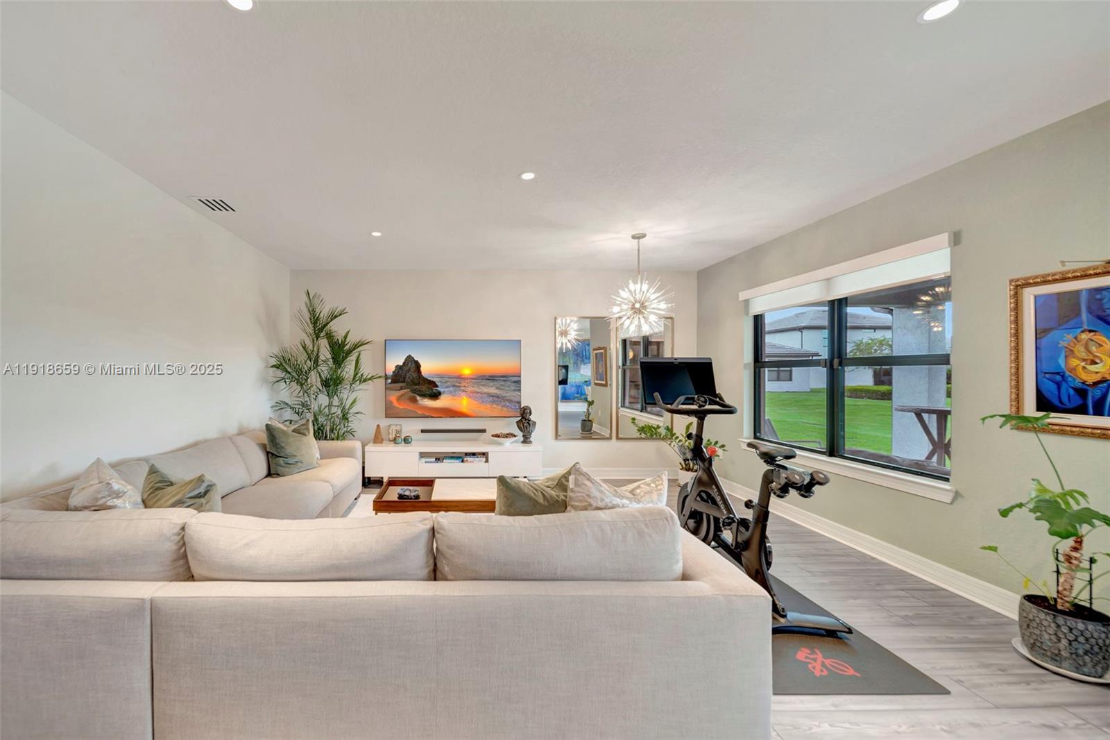 2941 Shortleaf Avenue Lauderdale Lakes, FL 33311 - Photo 27 of 47 a living room with furniture and a flat screen tv