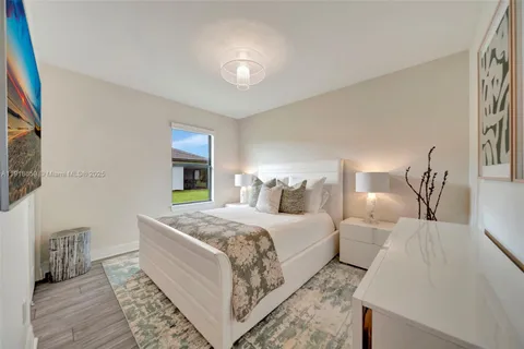 a bed room with a bed and a couch