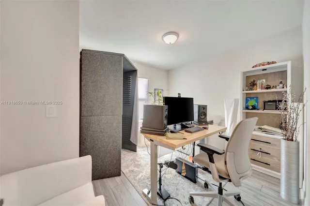 a workspace with furniture and lamp