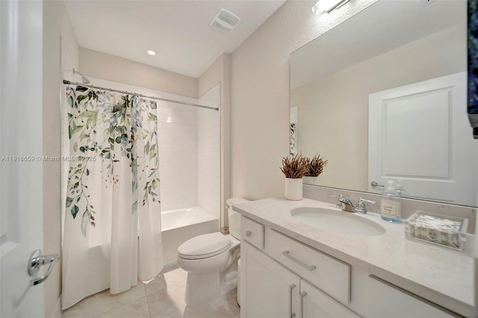 2941 Shortleaf Avenue Lauderdale Lakes, FL 33311 - Photo 36 of 47 a bathroom with a granite countertop sink toilet and shower