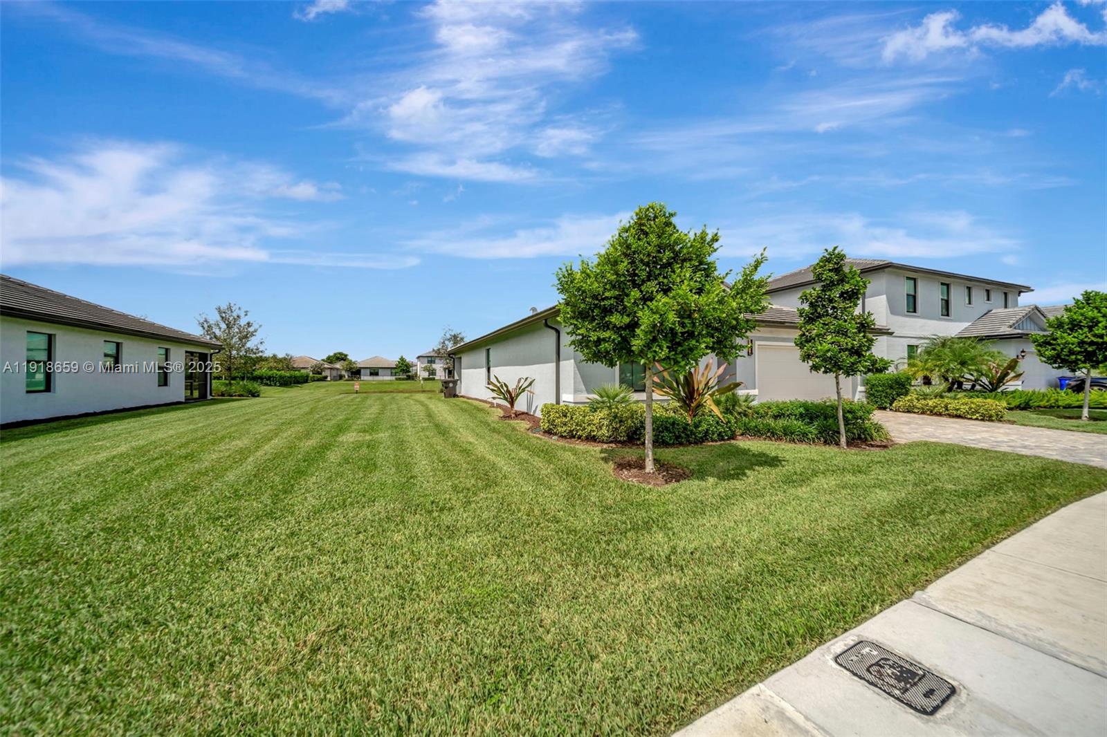 2941 Shortleaf Avenue Lauderdale Lakes, FL 33311 - Photo 43 of 47 a view of a house with a big yard