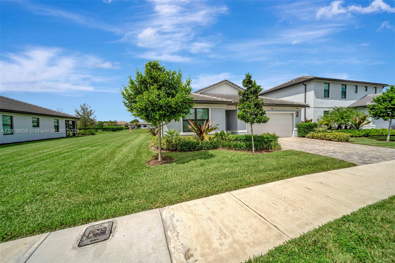 2941 Shortleaf Avenue Lauderdale Lakes, FL 33311 - Photo 46 of 47 a front view of house with yard and green space