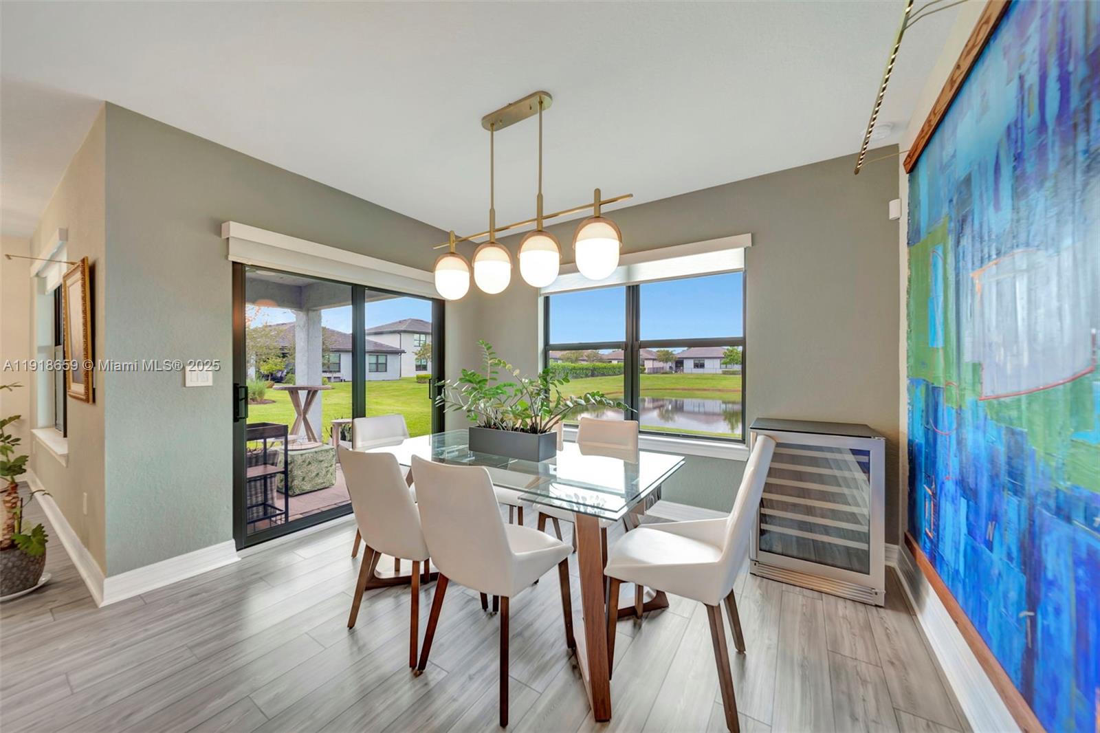 2941 Shortleaf Avenue Lauderdale Lakes, FL 33311 - Photo 6 of 47 a view of a dining room with furniture window and wooden floor