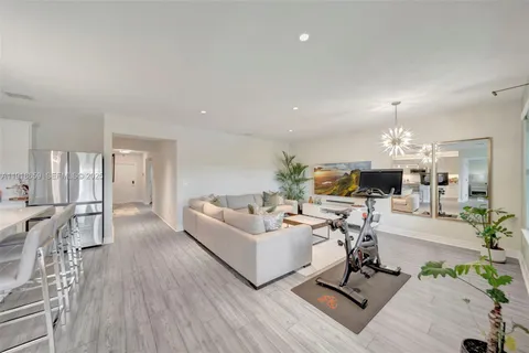 a view of a livingroom with furniture and a table