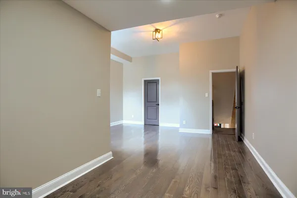 a bathroom with a double vanity sink mirror and shower