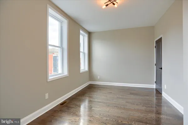 a view of an empty room and window