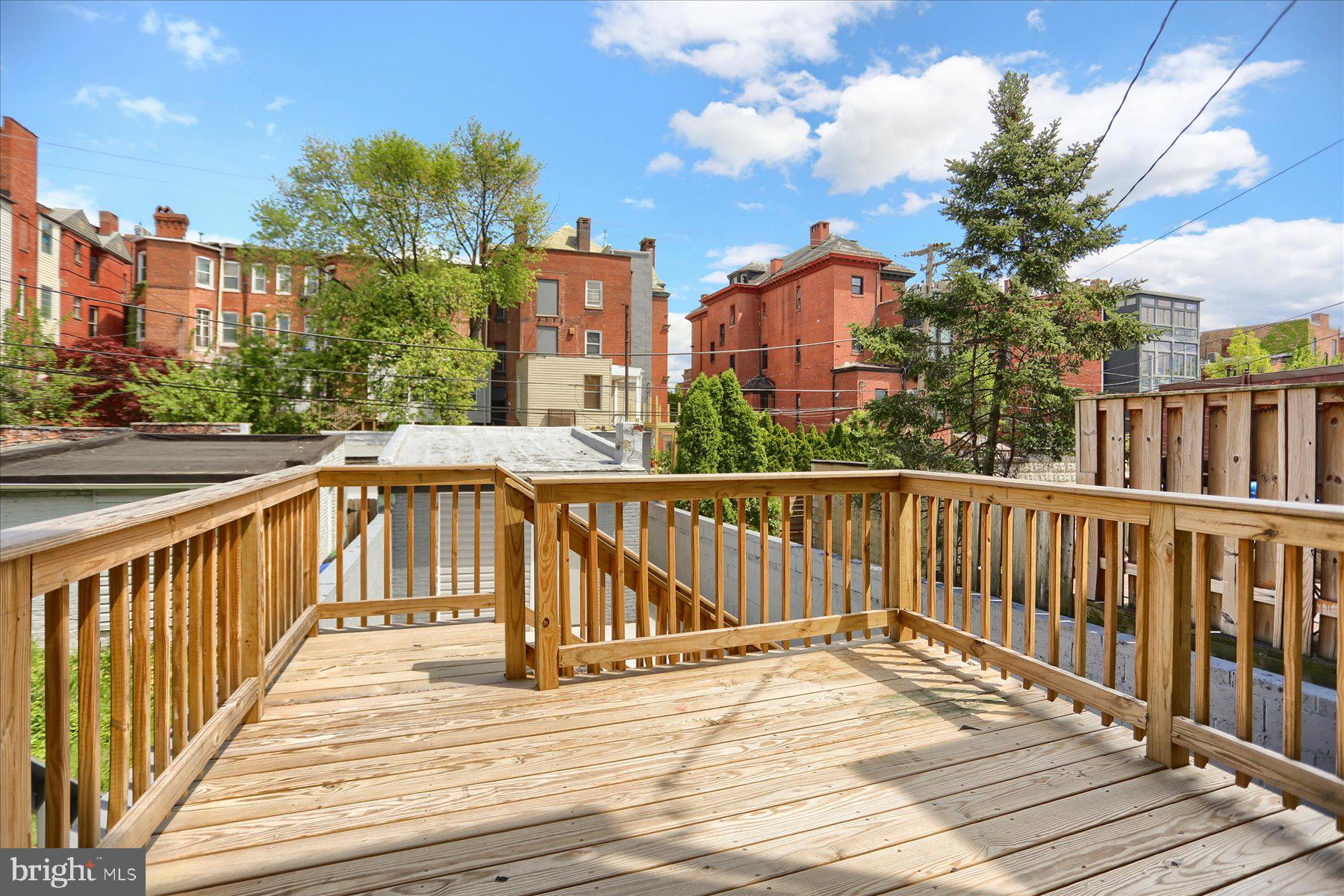 1811 Madison Avenue Baltimore, MD 21217 - Photo 33 of 37 a view of a balcony with city view