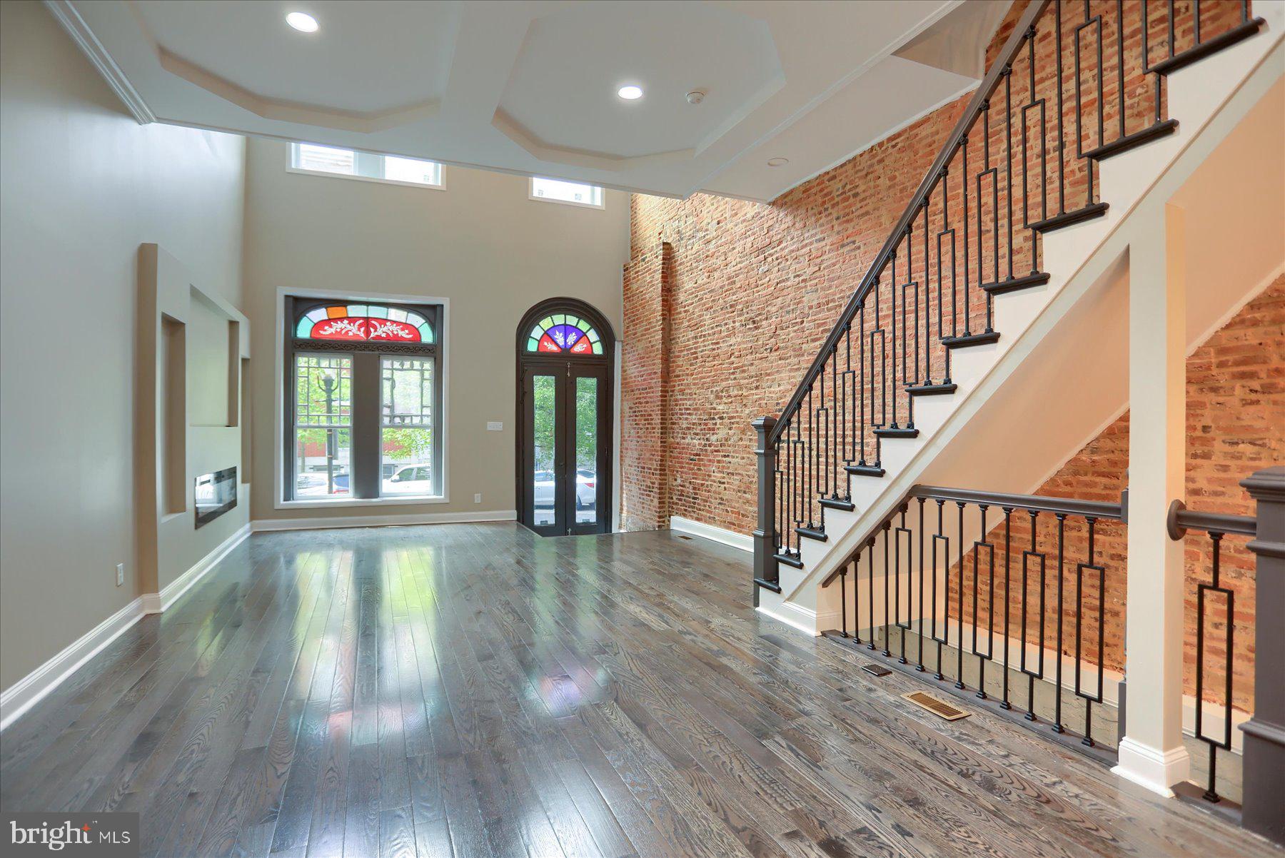 1811 Madison Avenue Baltimore, MD 21217 - Photo 7 of 37 a view of an entryway with wooden floor