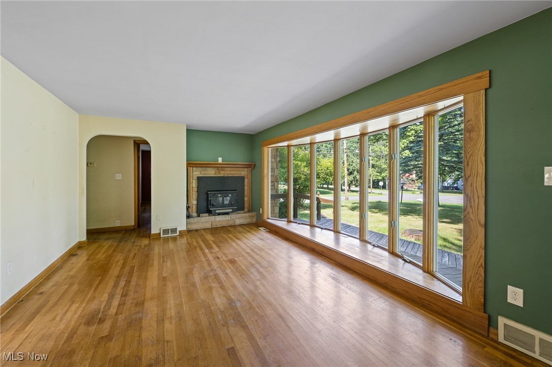 718 Fairwood Road Akron, OH 44319 - Photo 3 of 15 Unfurnished living room featuring light hardwood / wood-style flooring