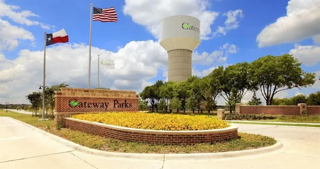 a view of a swimming pool with a yard