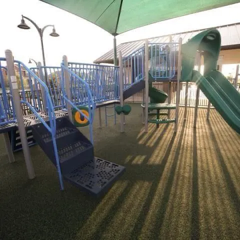 a view of a balcony with chairs