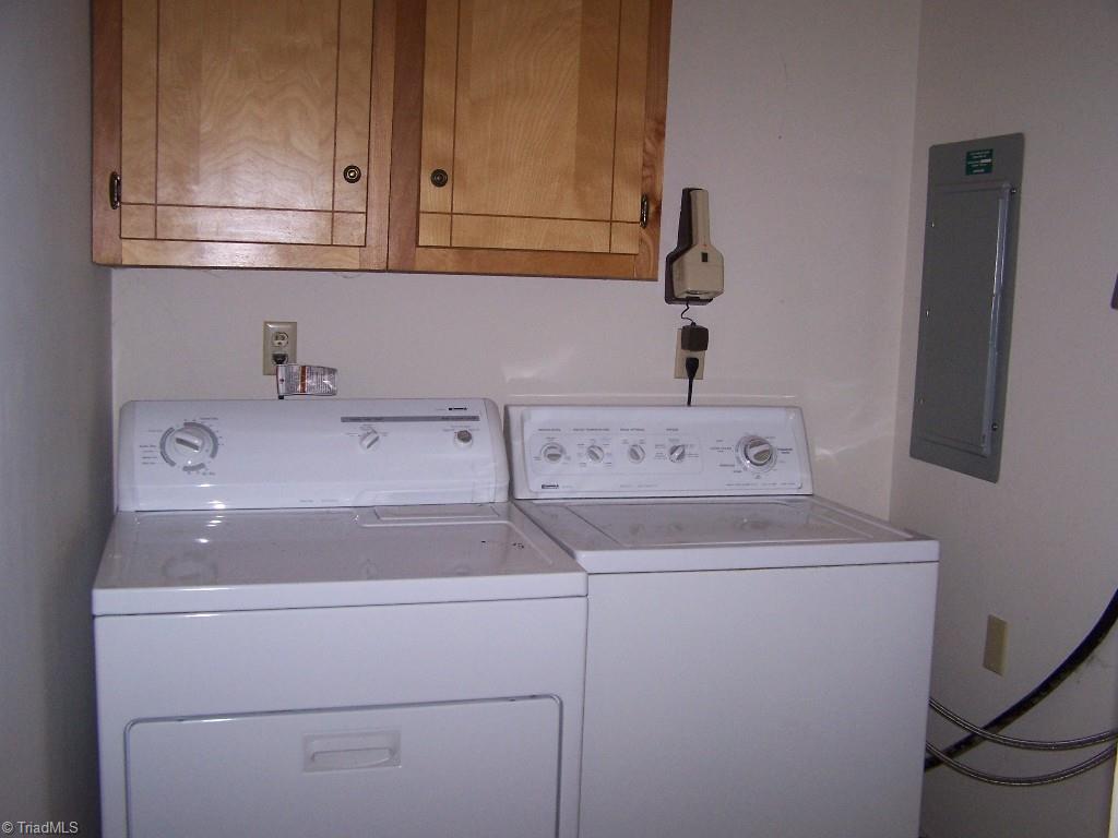 1310 Pebblebrook Road Winston-Salem, NC 27105 - Photo 21 of 25 Laundry room with washer and dryer included