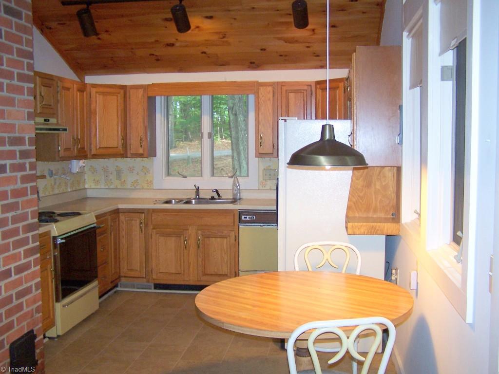 Kitchen with vaulted ceiling and breakfast nook