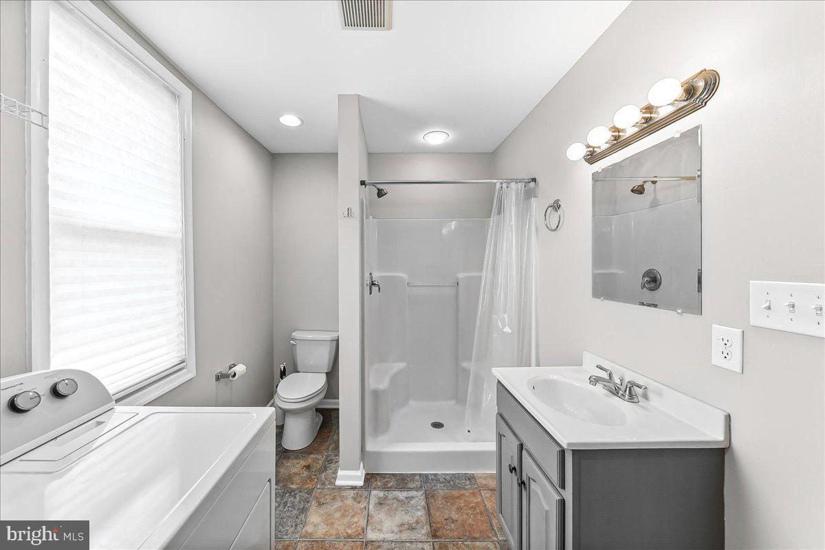 1019 Riverside Drive Pottstown, PA 19465 - Photo 23 of 36 Modern bathroom with natural light.
