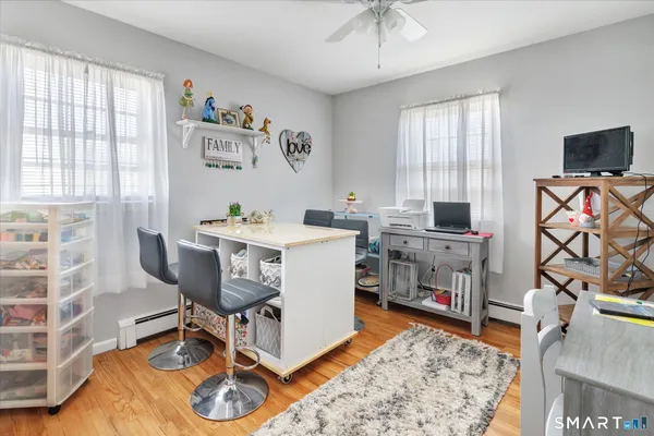 a room with a table and chairs