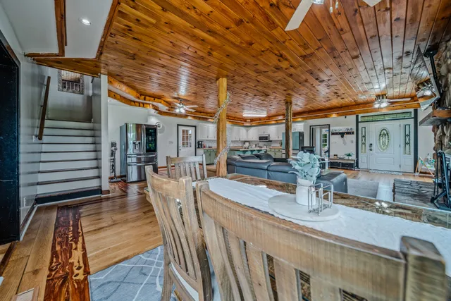 a bedroom with a bed and a table