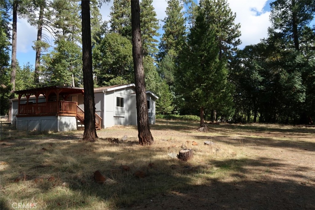 19138 New York Flat Road Forbestown, CA 95941 - Photo 11 of 37 a view of a house with a tree in front of it