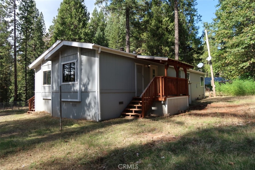 19138 New York Flat Road Forbestown, CA 95941 - Photo 8 of 37 a view of backyard of house and car parked