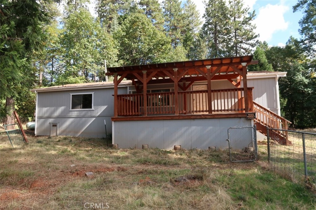 19138 New York Flat Road Forbestown, CA 95941 - Photo 9 of 37 a view of a house with a fence