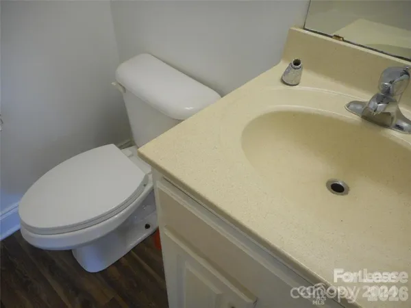 a bathroom with a sink and toilet