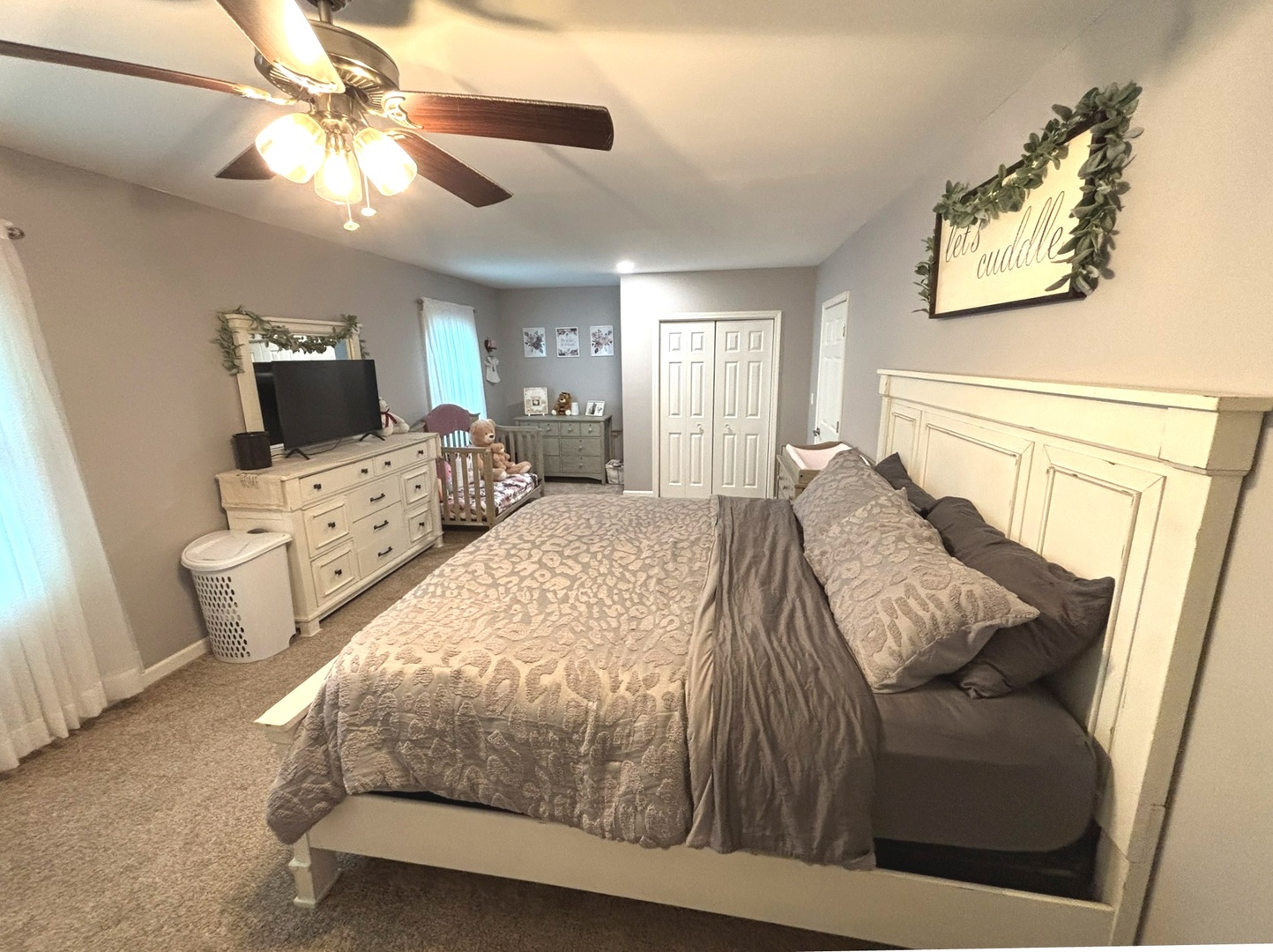440 North Indiana Avenue Salem, IL 62881 - Photo 8 of 15 a bedroom with a bed and a chandelier