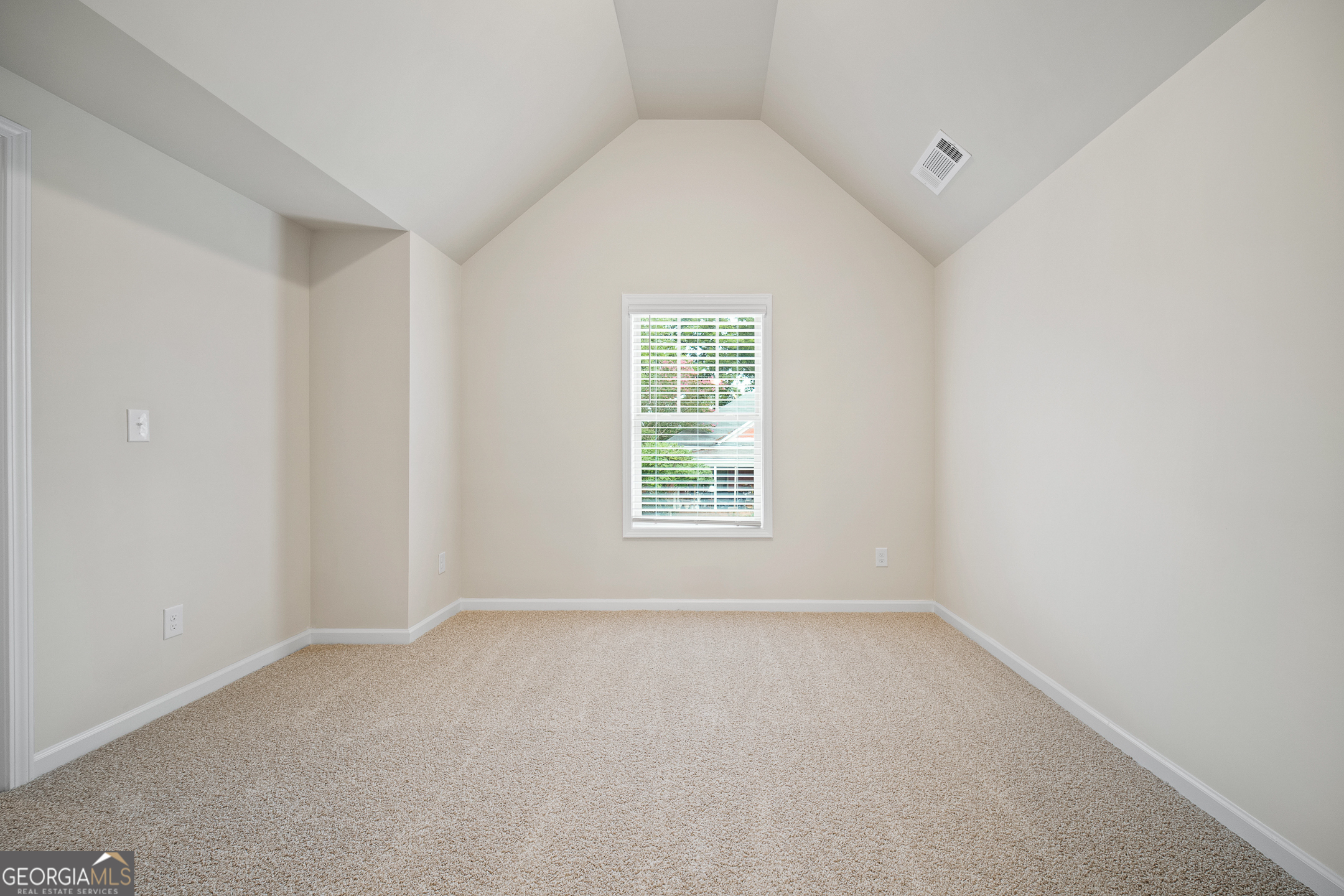 2275 Lovejoy Road Hampton, GA 30228 - Photo 12 of 20 an empty room with a window