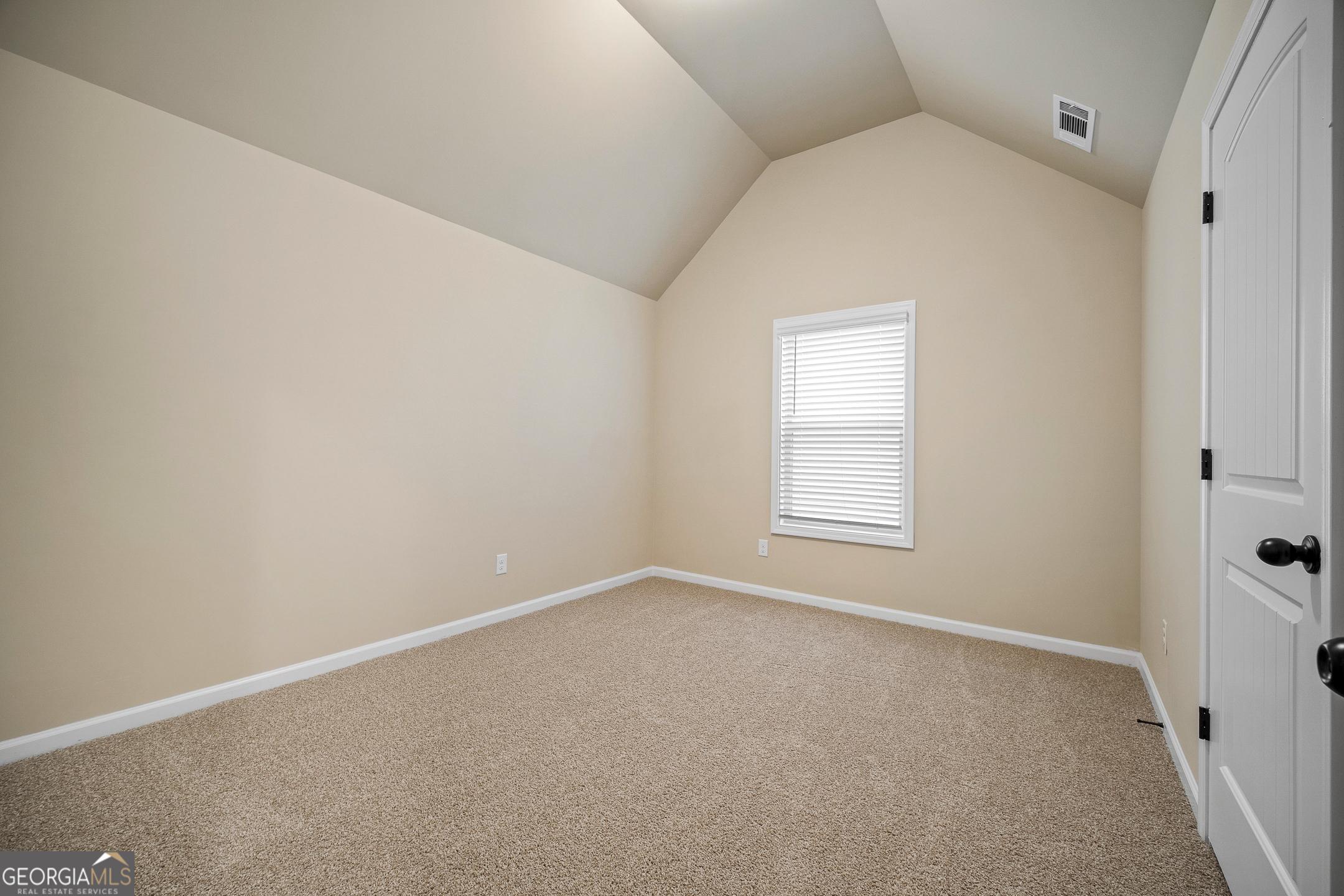 2275 Lovejoy Road Hampton, GA 30228 - Photo 14 of 20 an empty room with a window