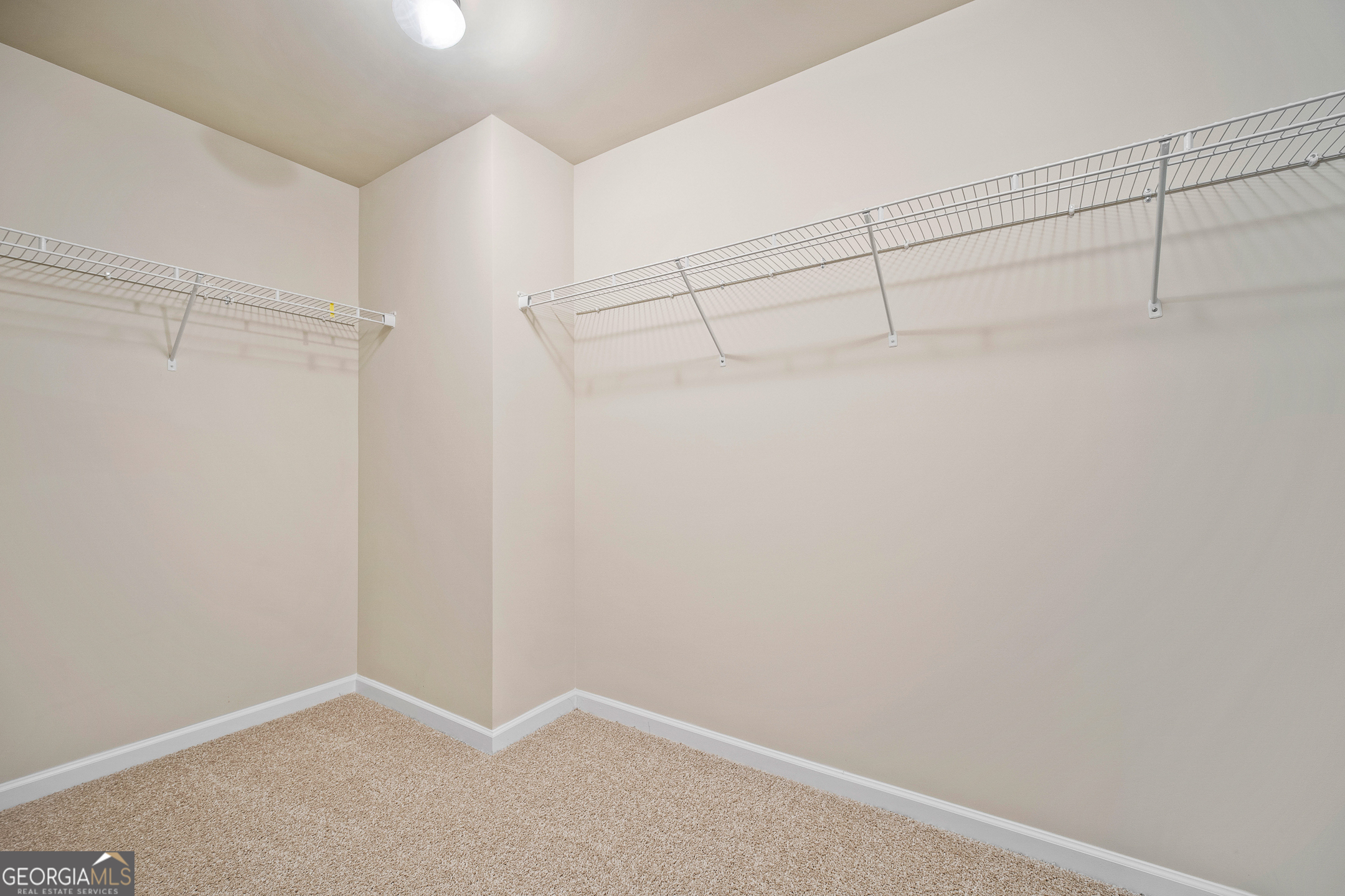 2275 Lovejoy Road Hampton, GA 30228 - Photo 19 of 20 a view of a room with racks on the wall