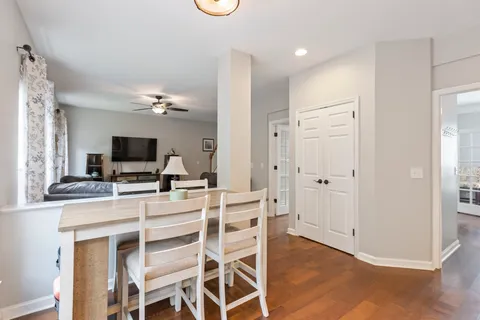 a kitchen with a table and chairs in it