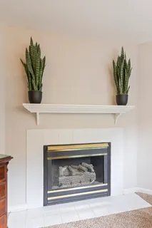 a view of walk in closet with clothes