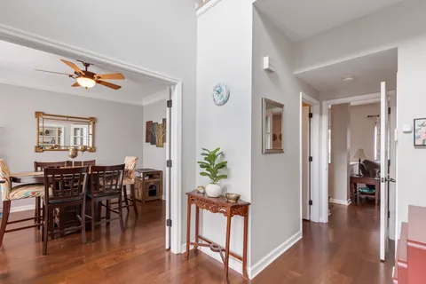 a view of a dining room with furniture window and wooden floor