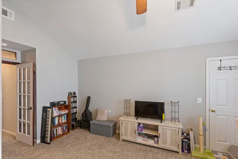 a view of a hallway view with windows