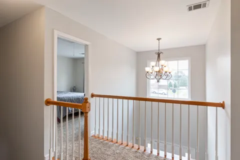 a view of a house with a table and chair