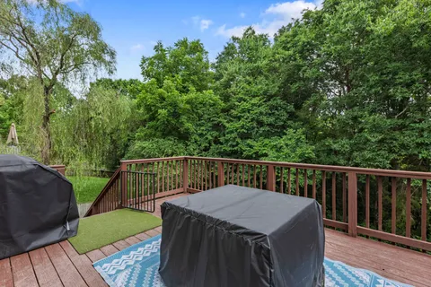 a front view of a house with large windows