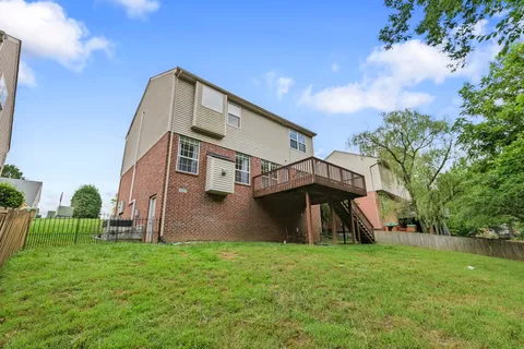 a view of a backyard with a trees
